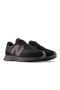 Pair of New Balance all black running shoes textured sole style 327 trainers