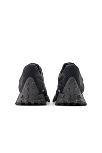 Pair of New Balance all black running shoes textured sole style 327 trainers