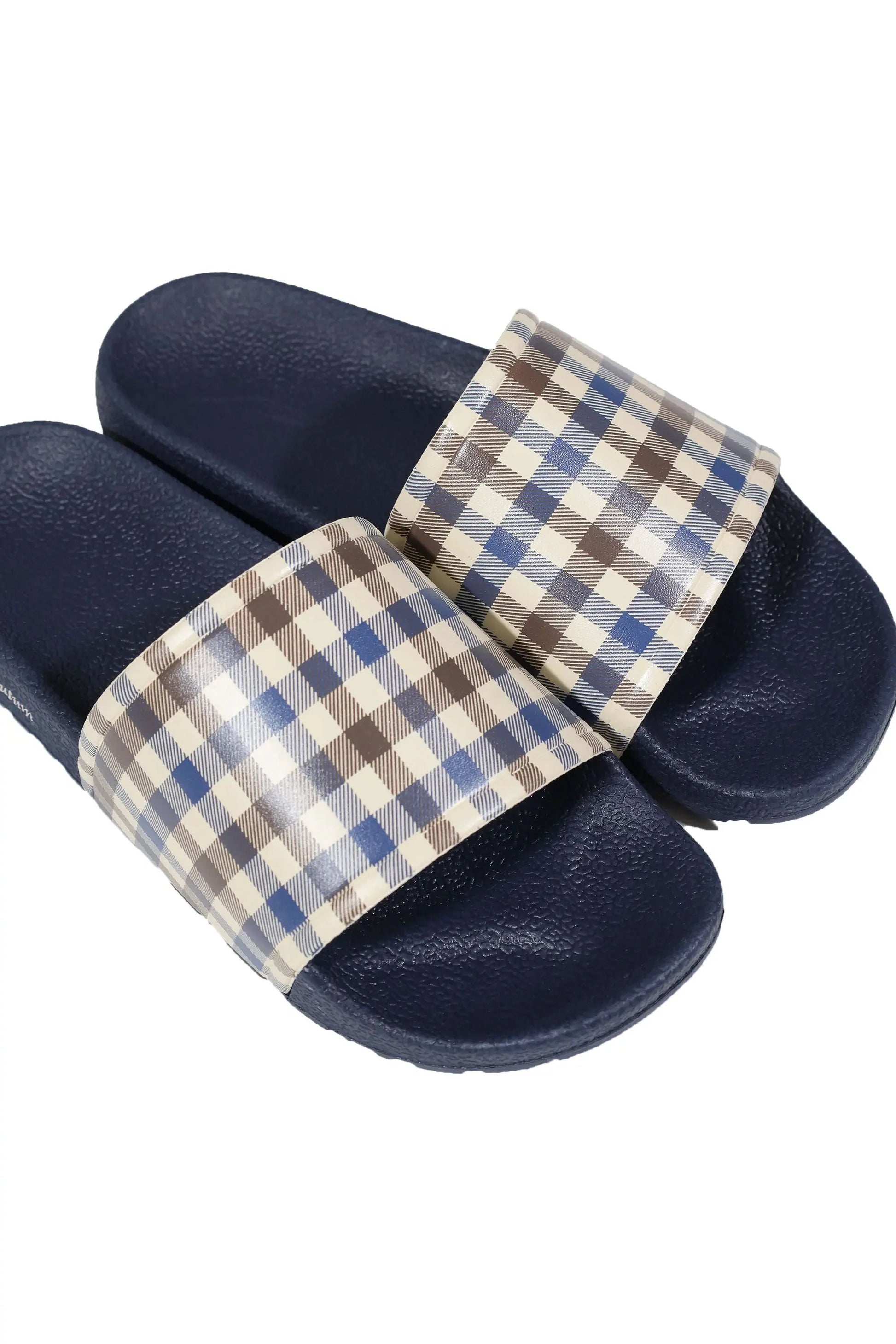 Top side angle photograph of a pair of sliders from the brand Aquascutum with their iconic check pattern on the show of the slider and the sole in the colour navy.