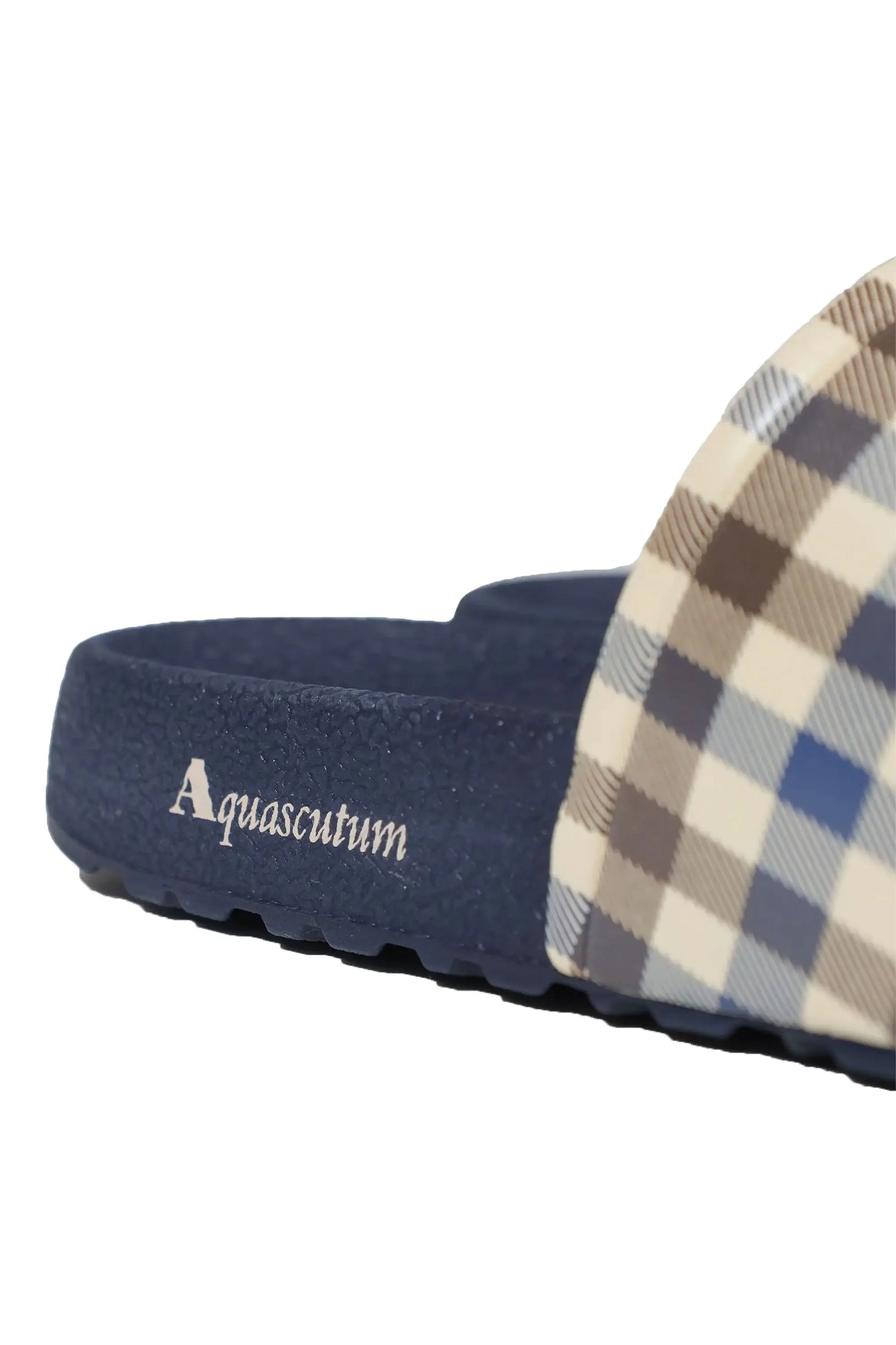 Side picture of the Aquascutum branded sole on a pair of sliders in the colour navy.