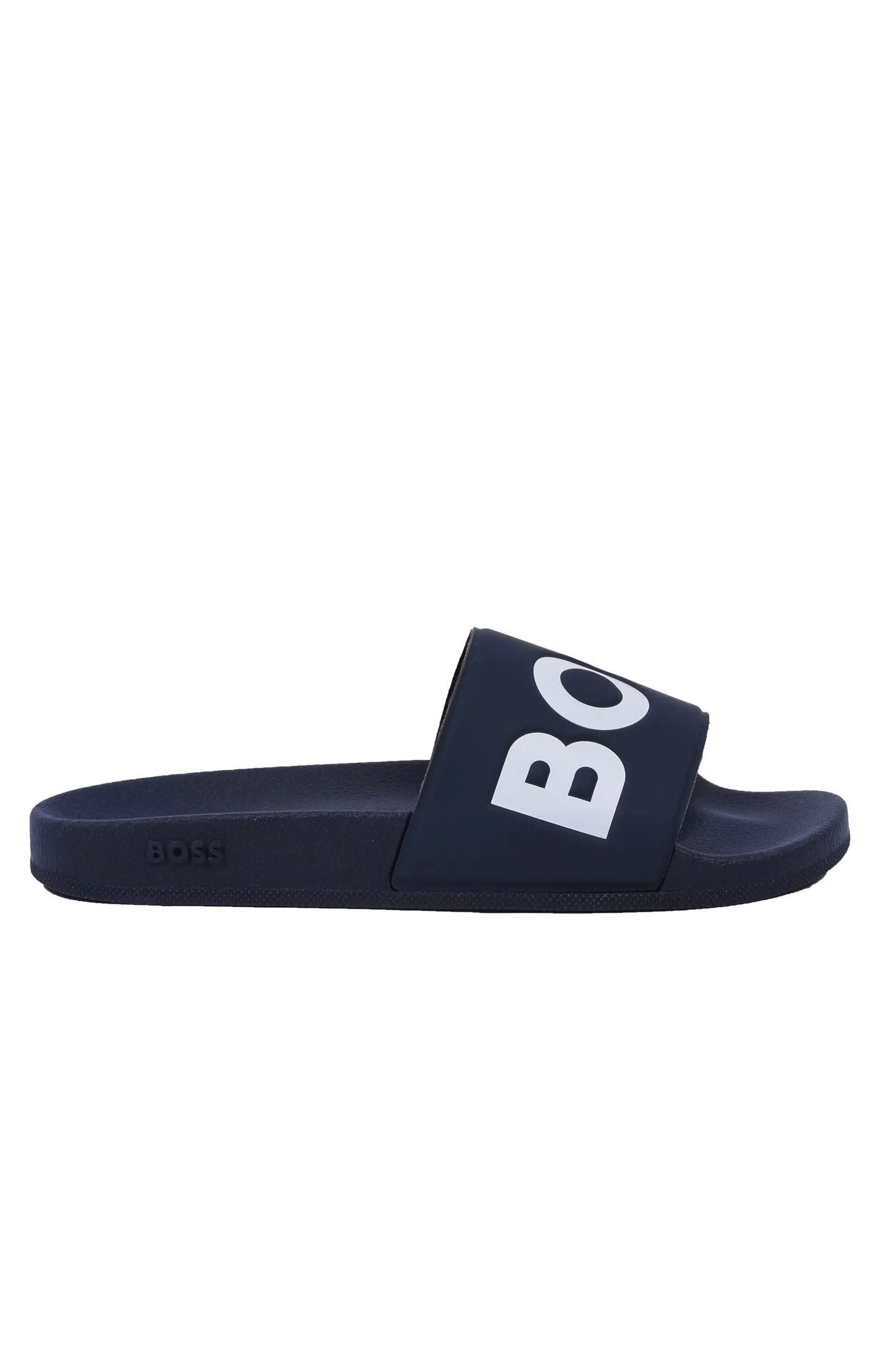 Side profile picture of a Boss Aryeh slider in the colour Dark blue with Boss written in bold upon the toe of the slider, pictured up on a white background.