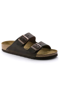 Brown BIRKENSTOCK sandal with cork insole on a white background