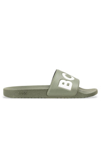Green slide sandal with 'BOSS' branding on a white background