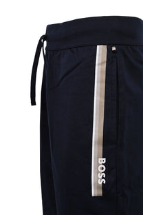 The side stripe branding and side pocket on a pair of Boss Black Boss authentic shorts in the colour dark blue