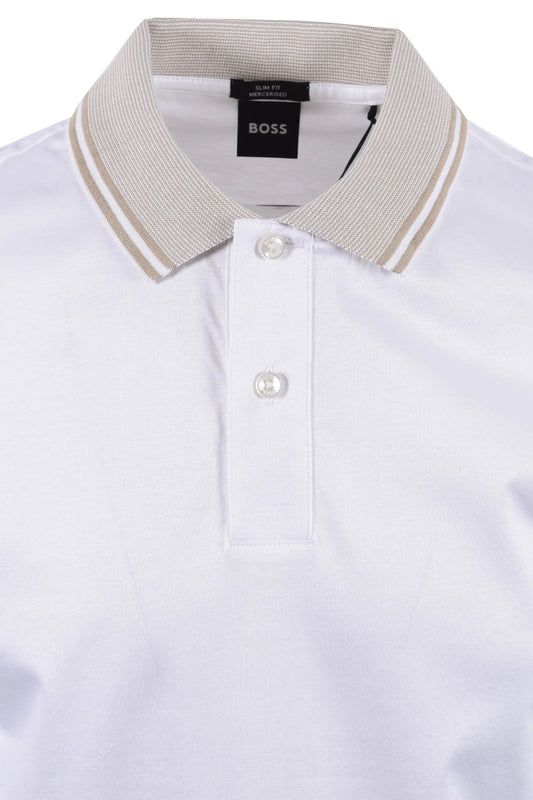 White polo shirt with beige collar and BOSS label on a white background