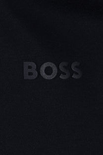 Close up of a Boss black printed logo on a Boss H Phillipson 200 polo in dark blue