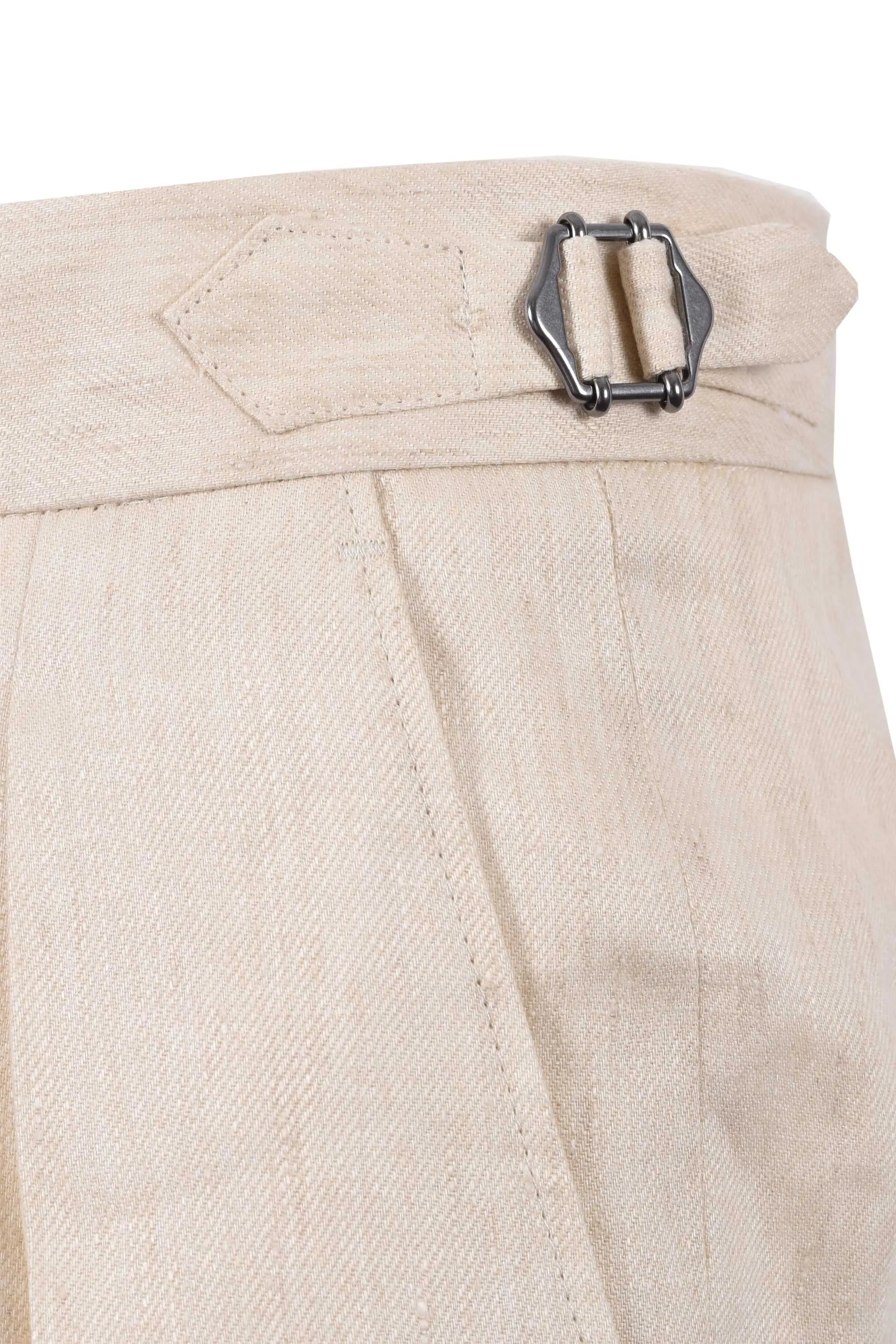 Close up of the side closure on the Boss black linen shorts in a beige colour.