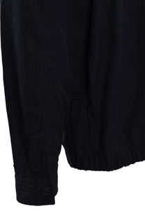 Dark blue BOSS overshirt close up of sleeve on a white background