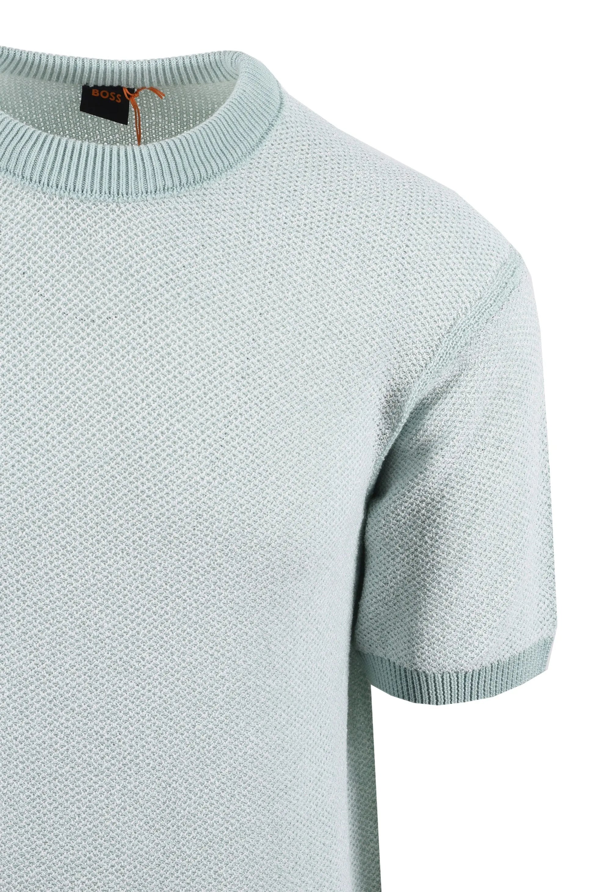 Light blue short-sleeve knit boss t-shirt on a white background