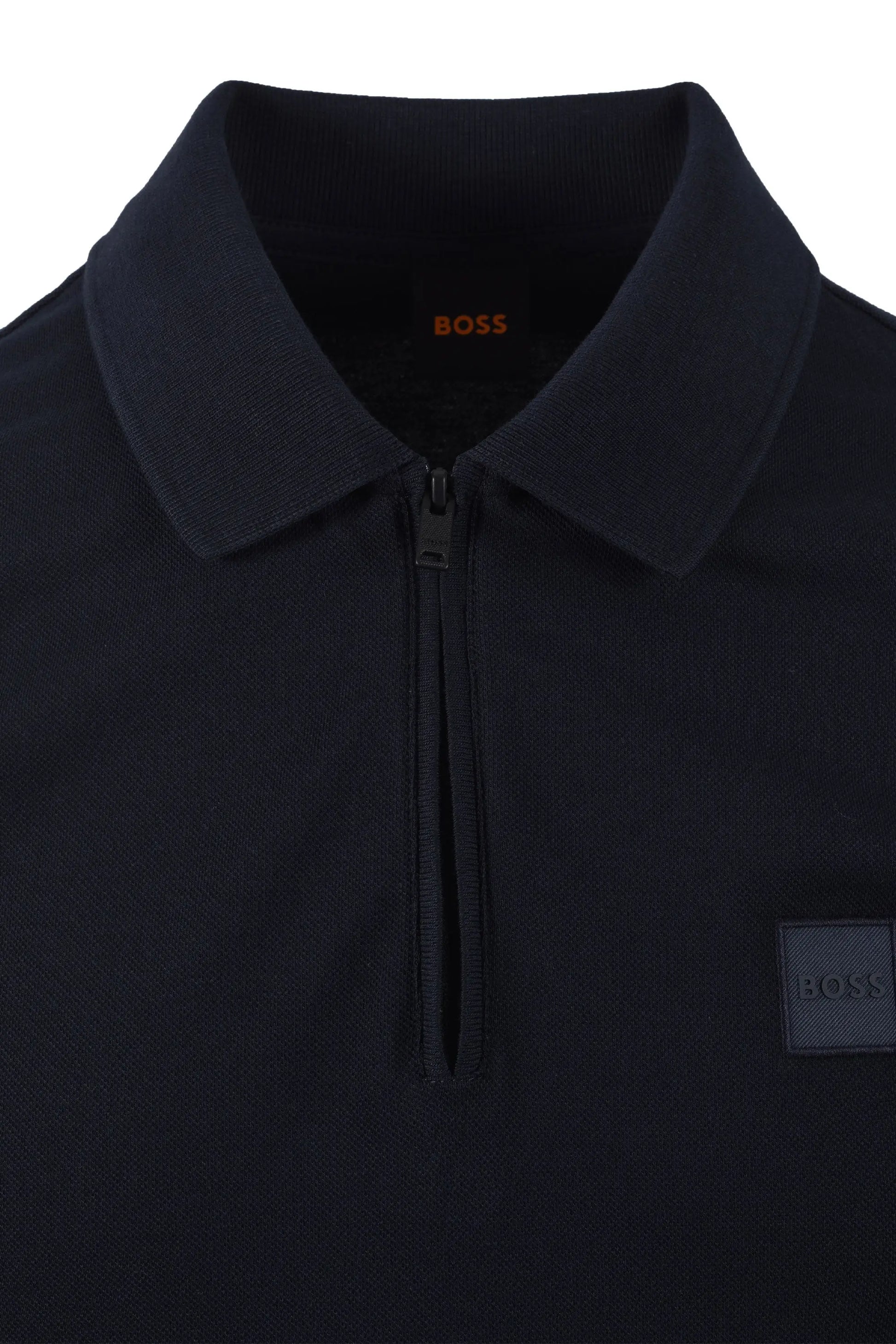 Navy blue polo shirt with a BOSS logo on a white background