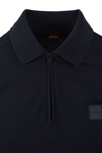 Navy blue polo shirt with a BOSS logo on a white background