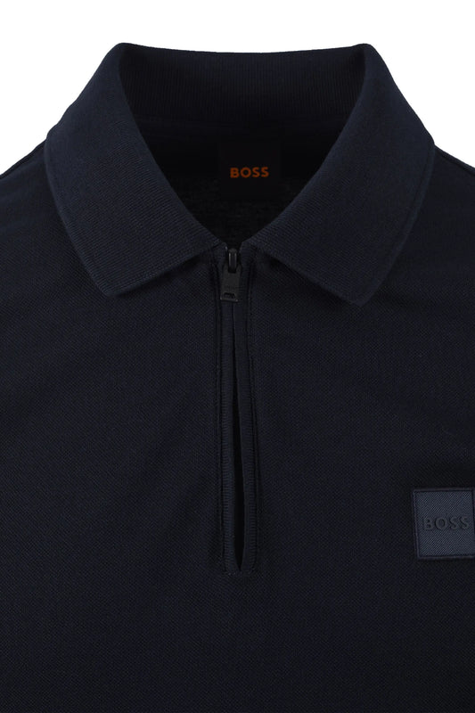 Navy blue polo shirt with a BOSS logo on a white background