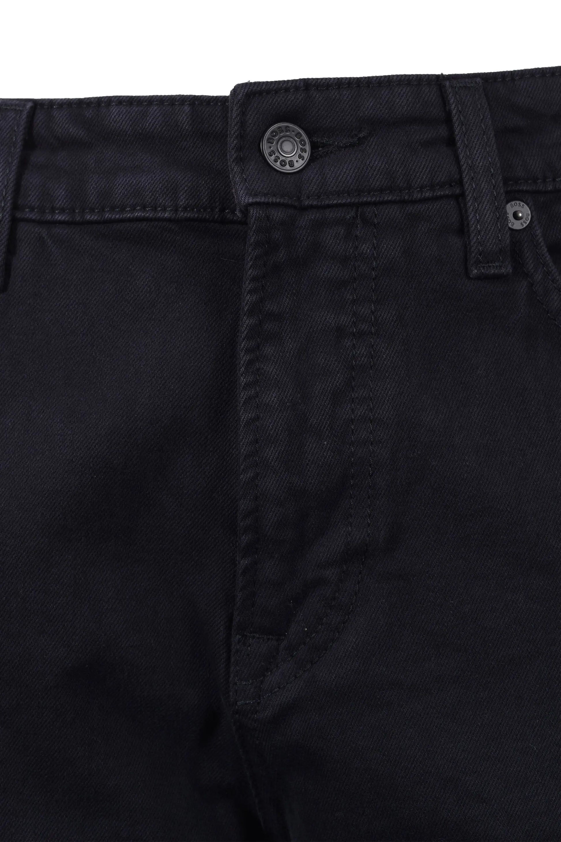 Close-up of dark blue BOSS pants with a button and stitching detail on a white background