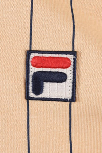 Close up of the Fila embroidered logo upon a neutral stripe background