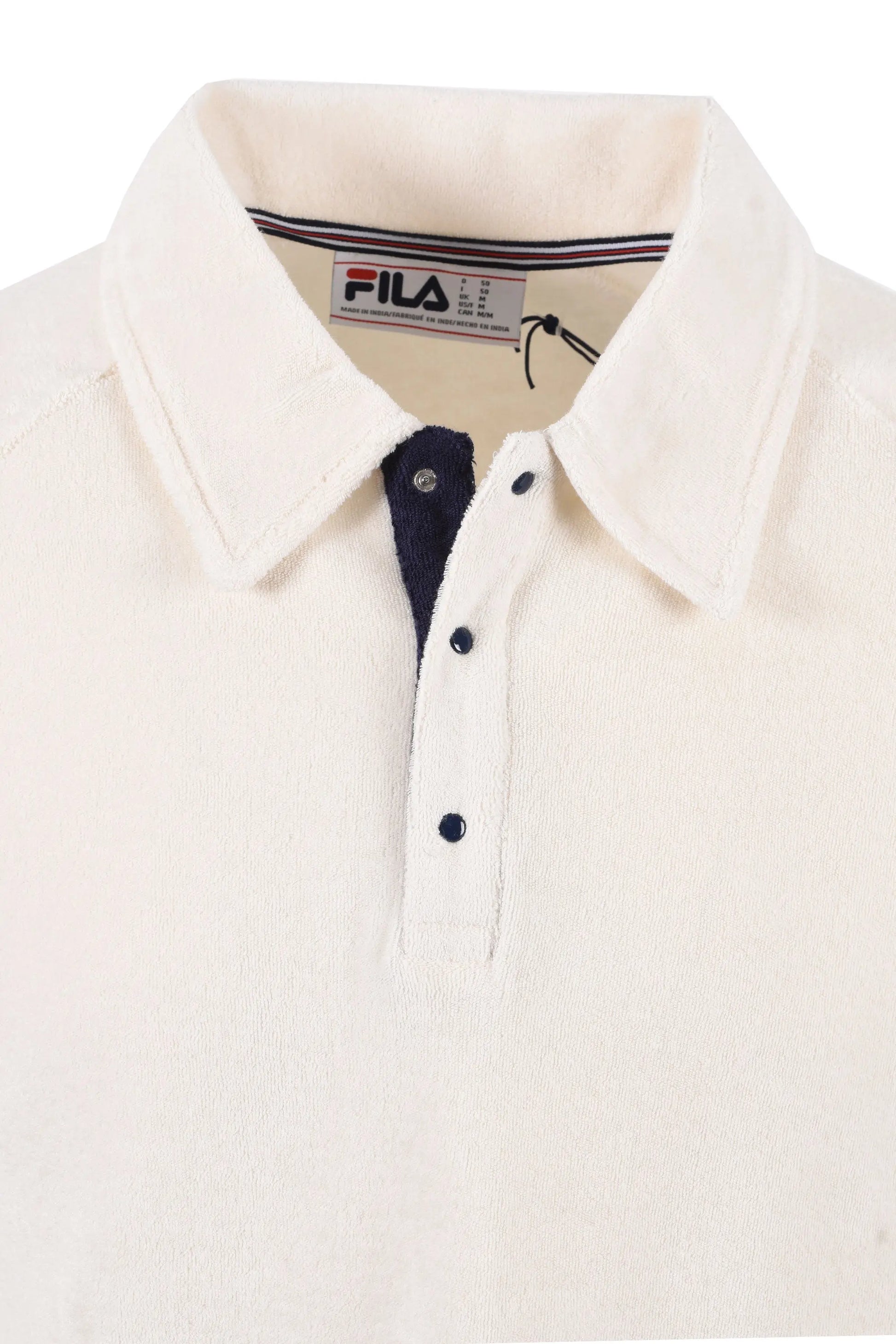 Close up of the Fila logo in the collar of the polo and of the collar and placket of the polo.
