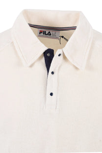 Close up of the Fila logo in the collar of the polo and of the collar and placket of the polo.