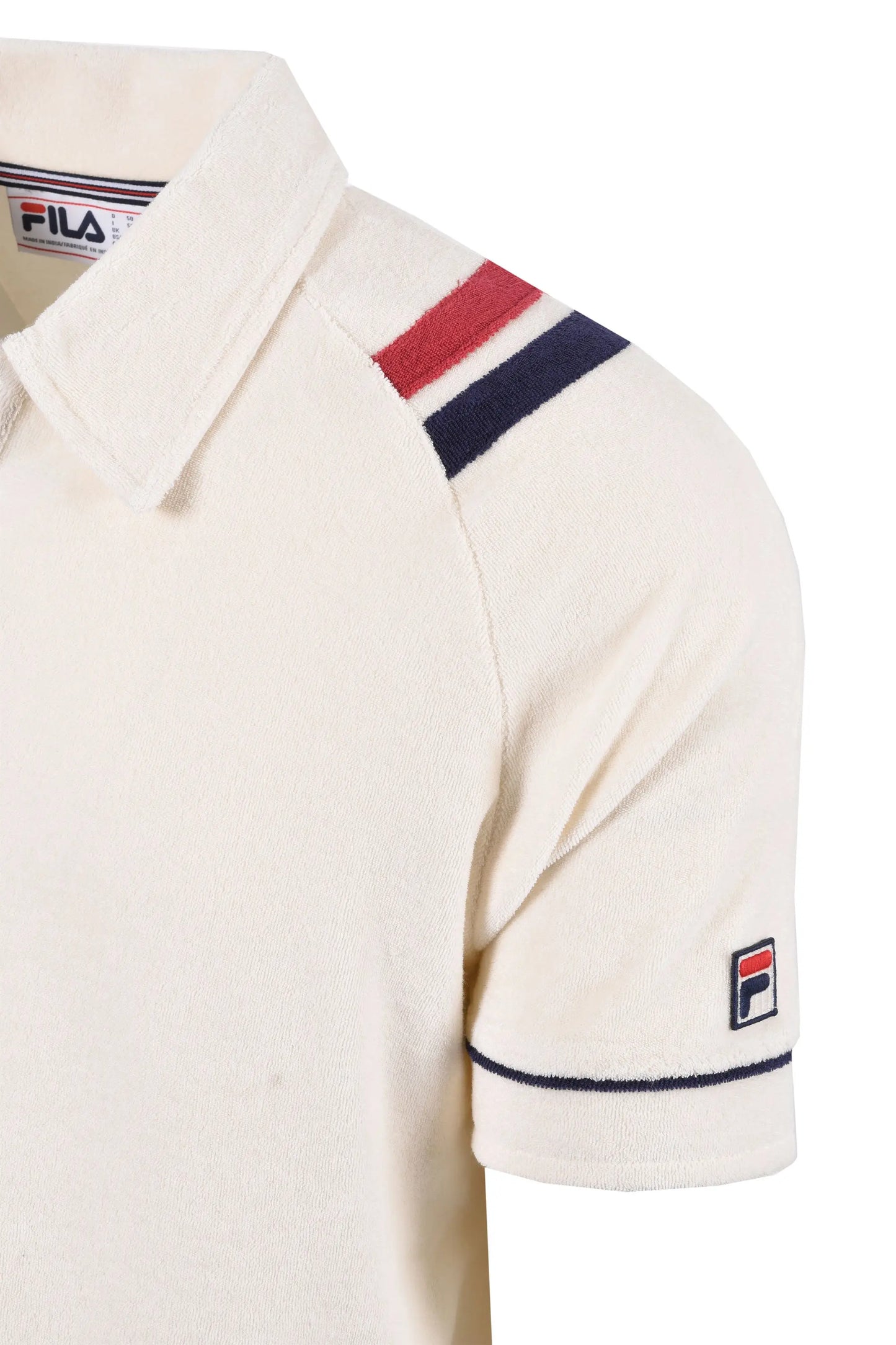 Picture of the shoulder thick twin stripe detailing in blue and red on the Fila Massimo terry polo in the colour gardenia