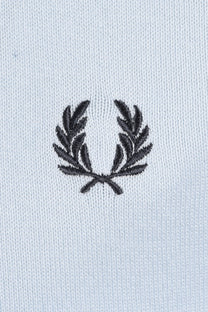Embroidered fred perry logo on a light blue polo