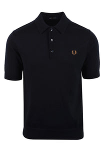 navy fred perry polo shirt with logo on chest against a white background