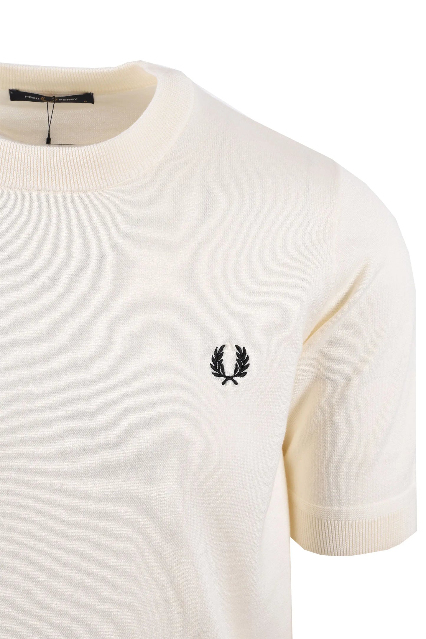 White knitted fred perry polo with a black logo on a white background