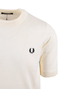 White knitted fred perry polo with a black logo on a white background