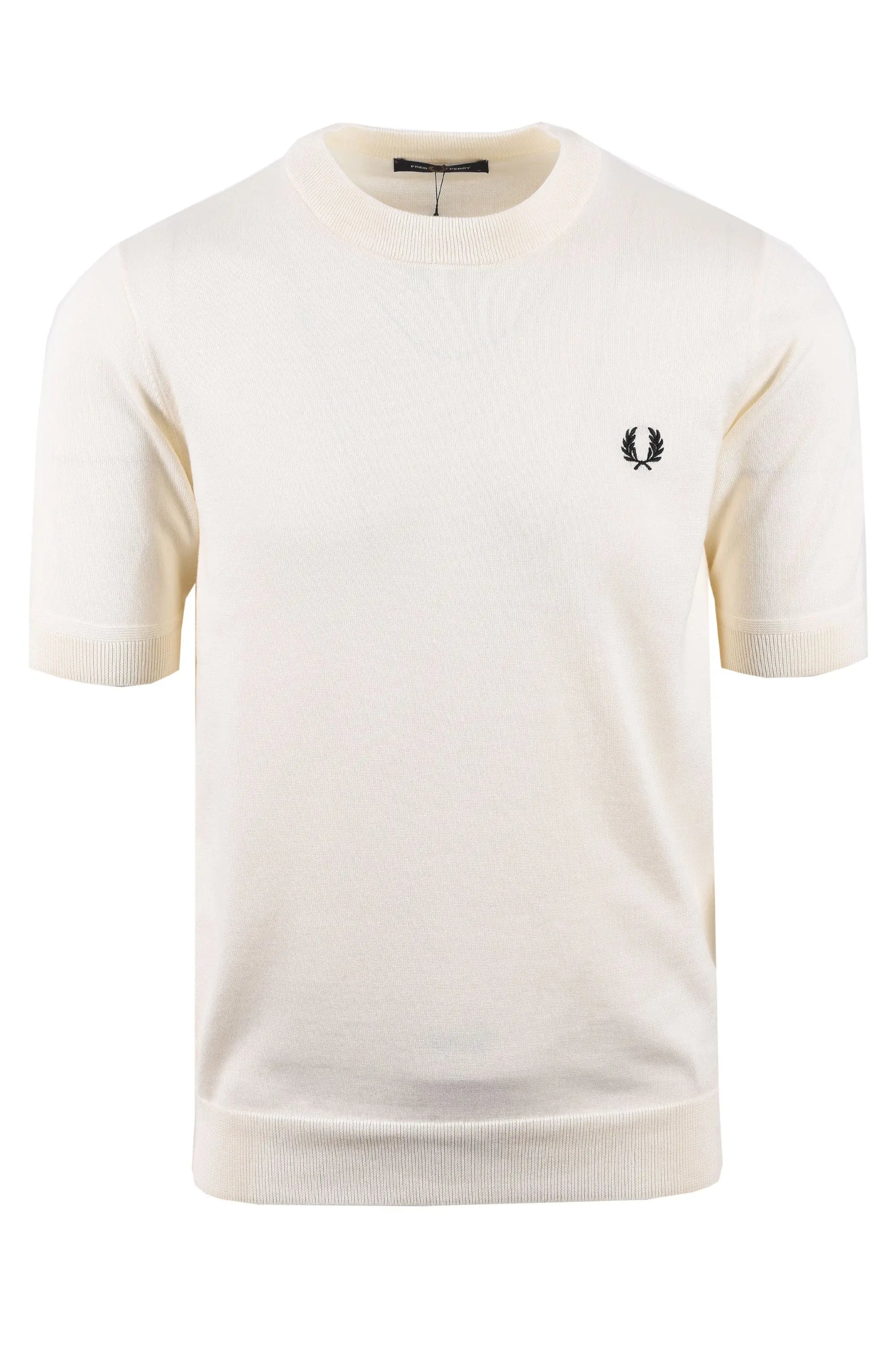 White knitted fred perry t-shirt with a small logo on a white background