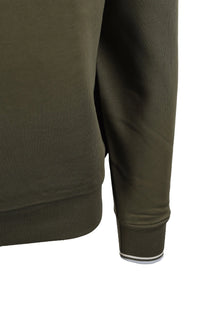 Close-up of a green fred perry sweatshirt with a white trim on a white background