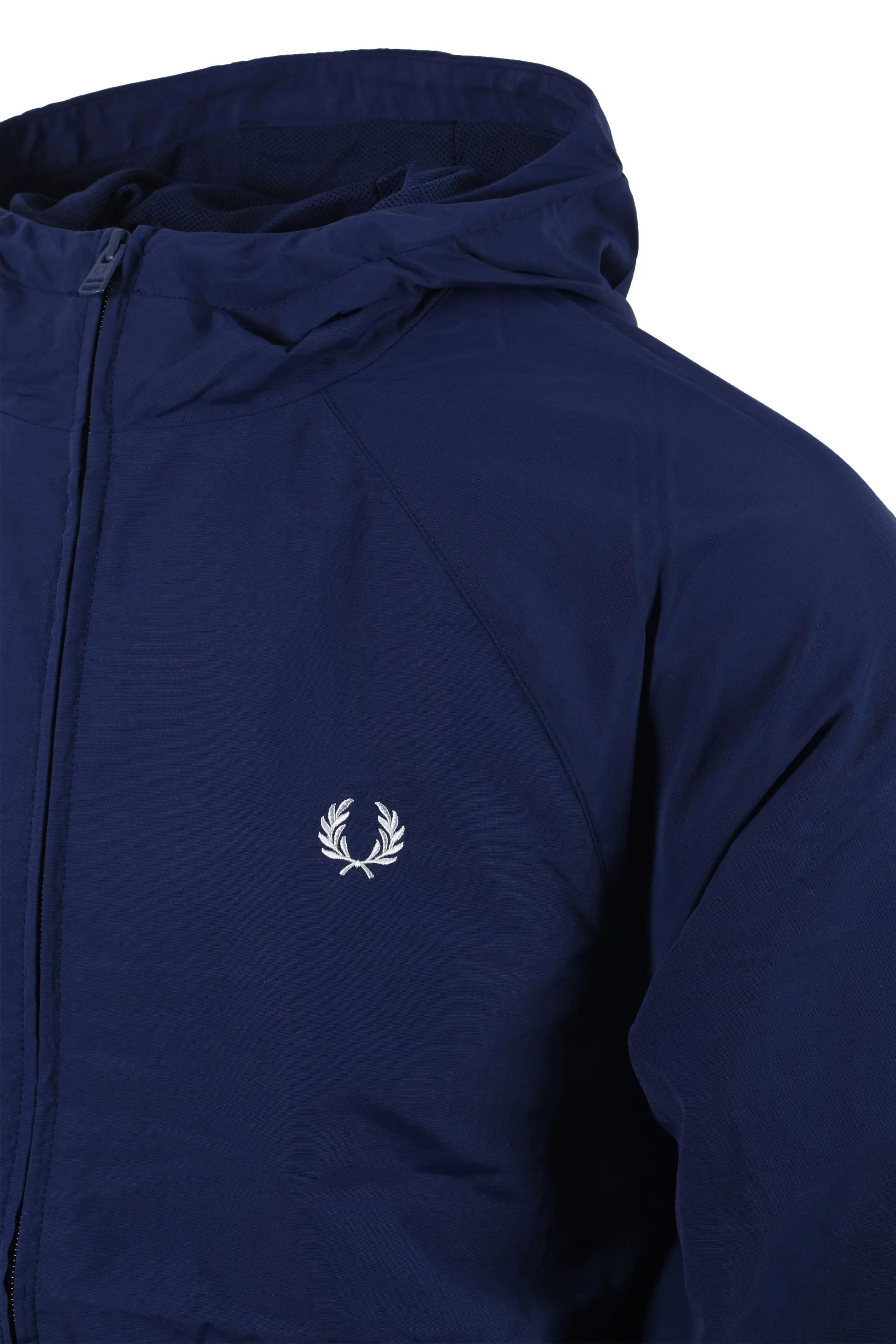 Side shot of a Fred Perry hooded shell jacket in the colour French navy. Shows the full length zipper as well as the iconic Fred Perry laurel Wreath logo.