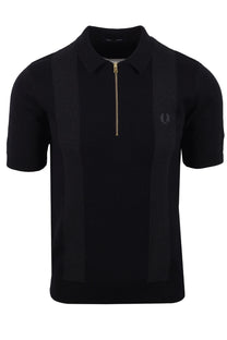 Black knitted fred perry polo shirt with a zipper on a white background