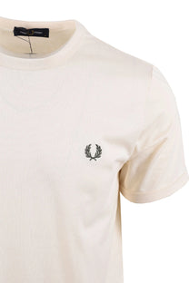 Beige t-shirt with a fred perry logo on a white background