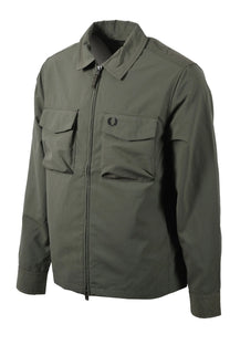 Green Fred Perry jacket with two front pockets on a white background