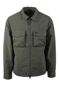 Green Fred Perry jacket with two front pockets on a white background