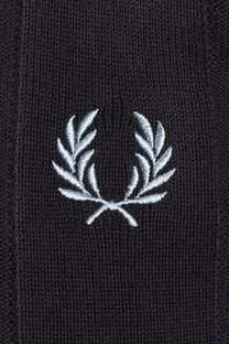 Close-up of a light blue embroidered fred perry logo on a dark grey polo