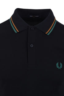 navy fred perry polo shirt with green and orange trim and Fred Perry logo on a white background
