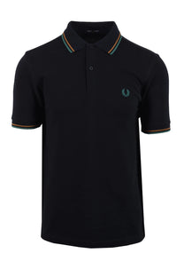 navy fred perry polo shirt with brand logo on a white background