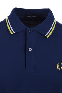 Navy blue fred perry polo shirt with yellow and white trim and Fred Perry logo on a white background