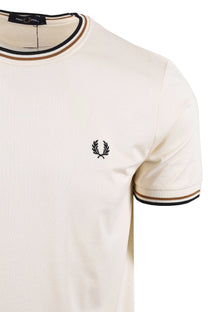 White fred perry t-shirt with black and gold trim and a logo on a white background