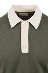 Close up of the contrasting colour 3 button placket on a Gant cotton modal knitted polo in the colour dry herb.