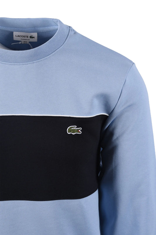 Side image of a Lacoste sweatshirt, featuring the iconic Lacoste crocodile logo.