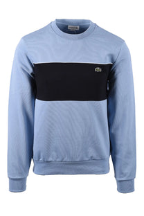 Full image of a Lacoste colour block sweatshirt, features the iconic Lacoste crocodile logo.