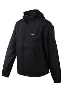 Full image of the Lacoste lightweight hooded waterproof jacket in black.