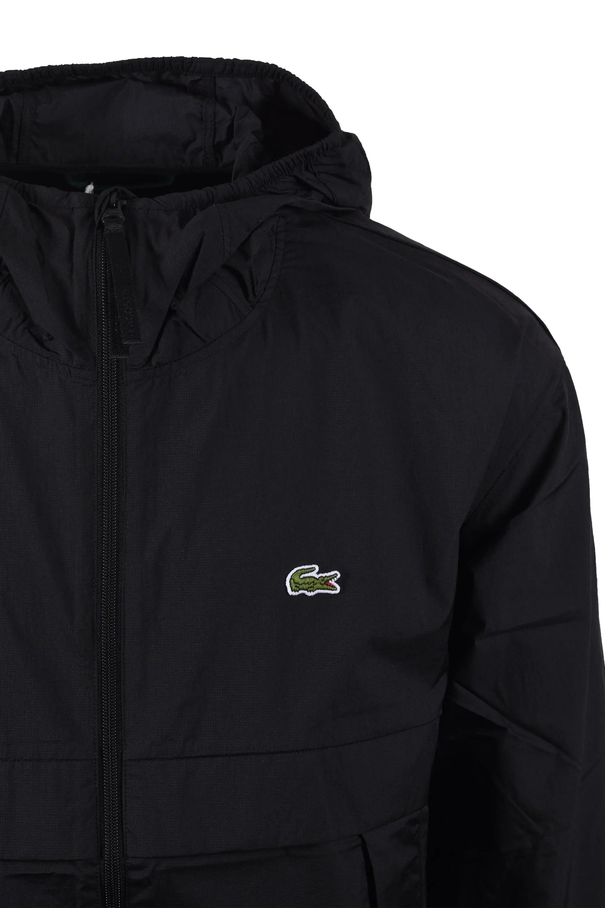 Side picture of a Lightweight water proof jacket, Features the iconic Lacoste logo.