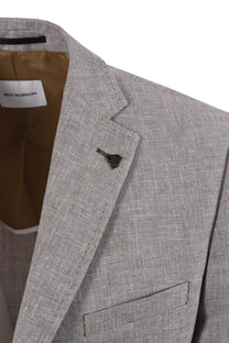 Close up of the notch lapel of a Roy Robson beige coloured linen blazer jacket.