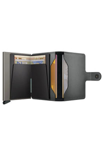 Black SECRID wallet with card slots on a white background