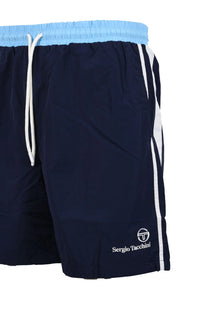 Side picture of a pair of Sergio Tacchini shorts in navy showing the bold twin stripes down the side of the leg as well as Sergio Tacchini embroidered logo on the front of the shorts.