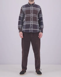Video of man wearing Barbour branded tartan shirt and trousers 