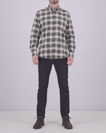Video of a man wearing a Barbour tartan shirt with a pair of jeans and trainers