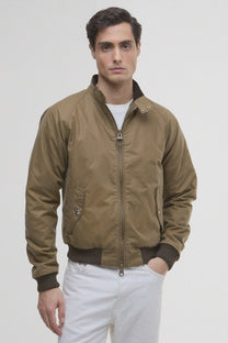 Man wearing a Barbour jacket in beige 