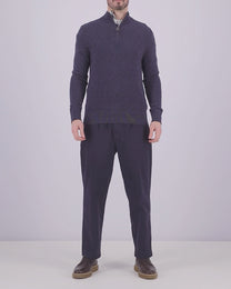 Video of a man wearing Barbour half zip knitwear in navy blue 