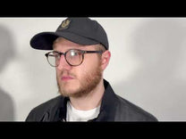 Belstaff ground jacket review, cover image is a man wearing a Belstaff hat